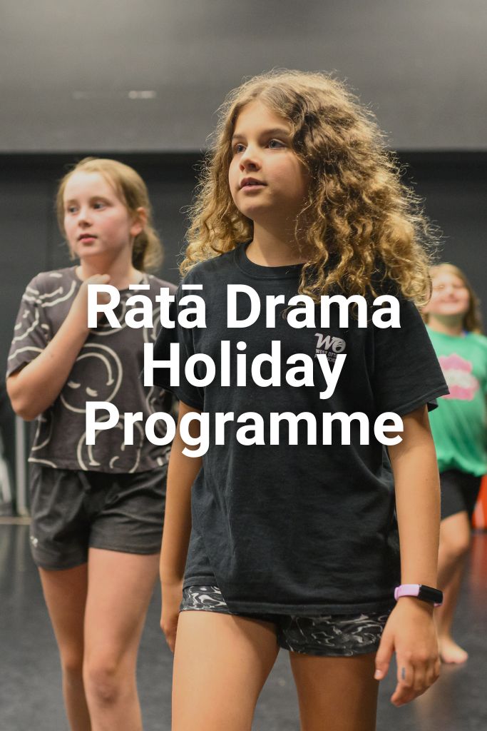 Two girls walking with purpose towards the camera. Click on this image to learn more about the Drama Holiday Programme.